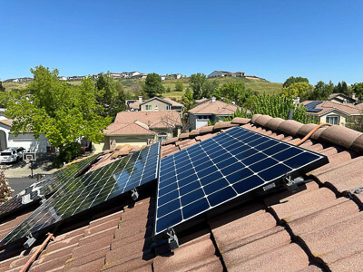 Residential rooftop solar installation after professional solar panel cleaning